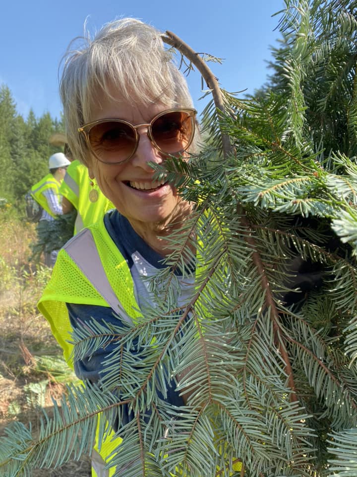 CARE Summit 2023 at Highland Flats Tree Farm -September 2023 12 14. Elisa McClure with a bountiful harvest of Grand Fir in hand